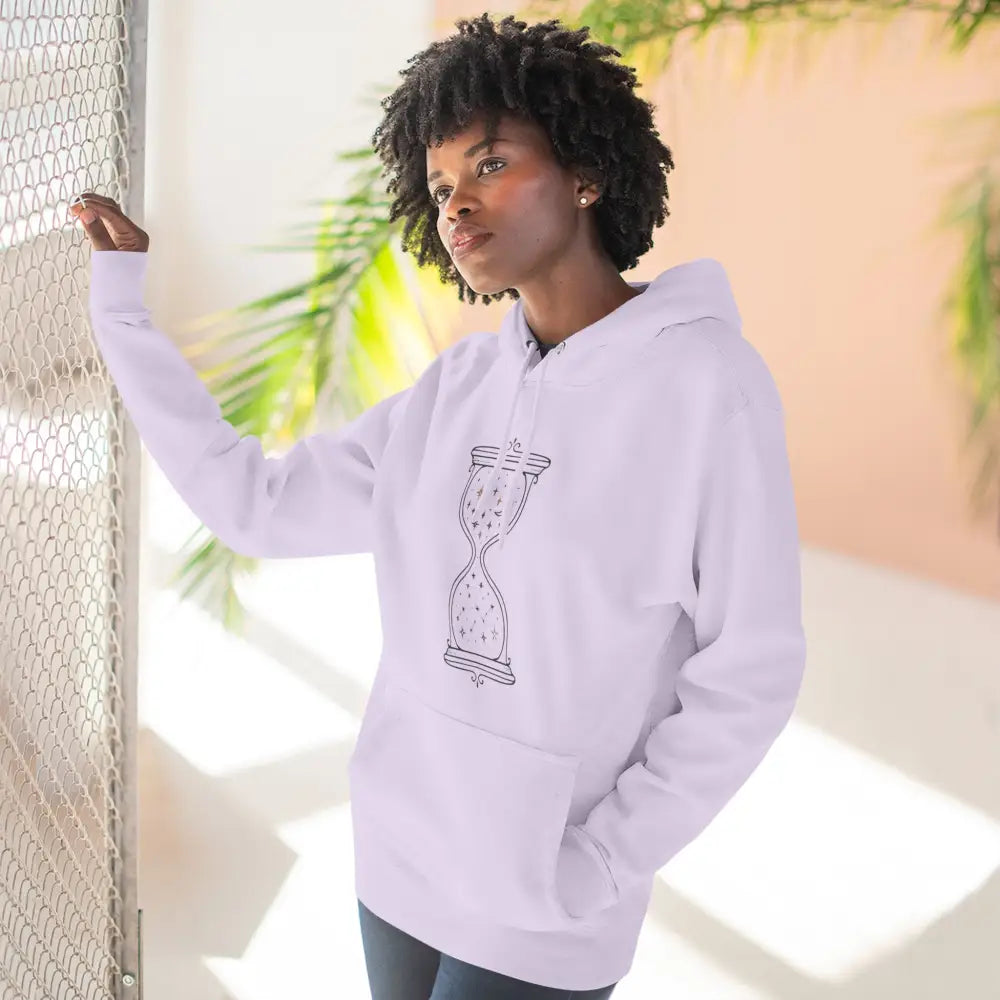 White fleece hoodie with hourglass design, ideal for all seasons, easy care instructions