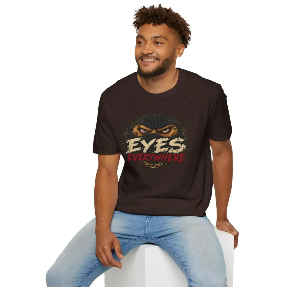 Black short-sleeved eyes everywhere t-shirt with creepy masked eyes graphic made of ring-spun cotton with ribbed collar