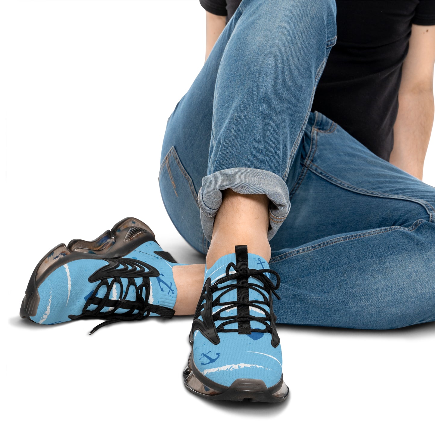 Men's mesh sneakers in light blue with nautical anchor print and dark sole.