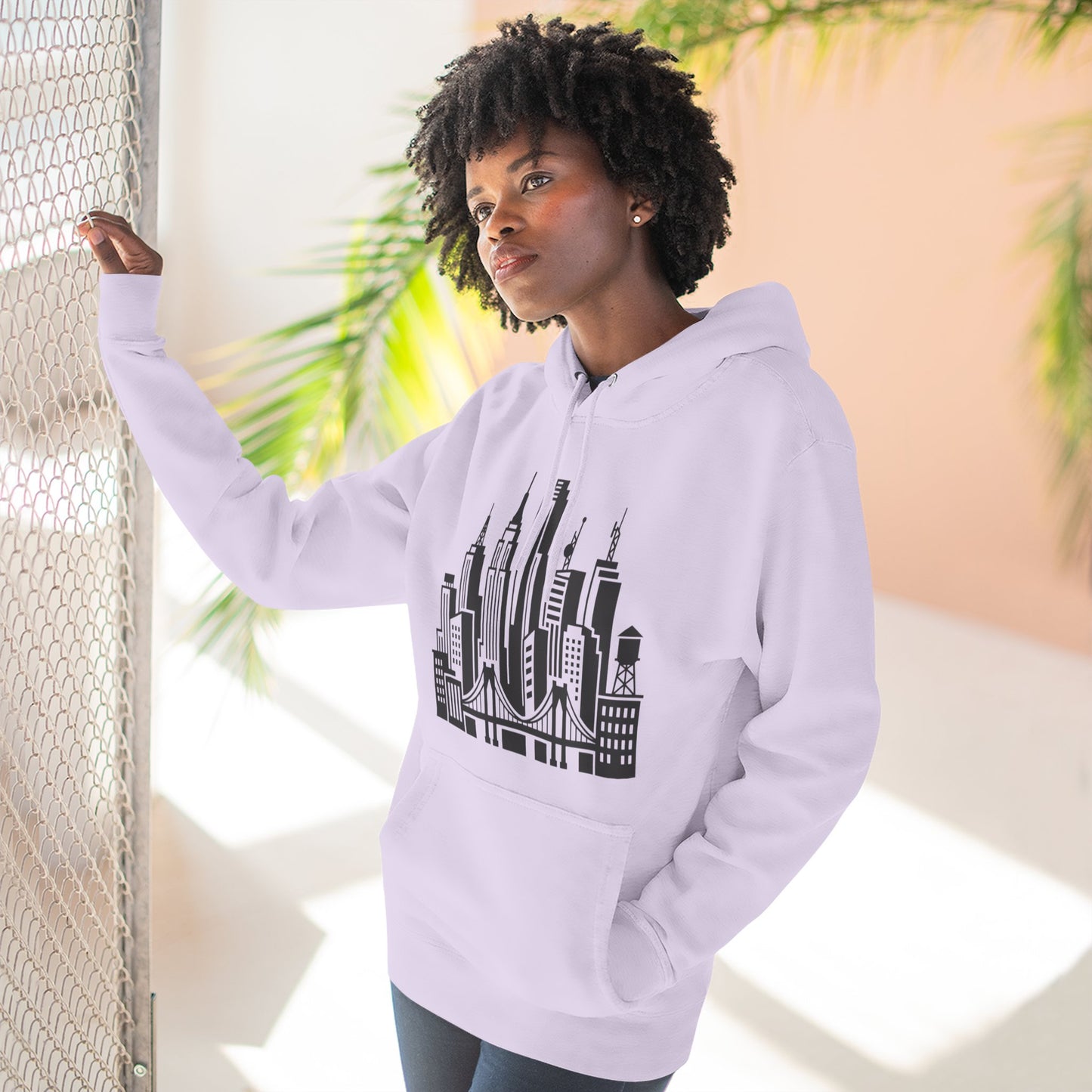 Lilac pullover hoodie with black skyline bridge graphic and front kangaroo pocket