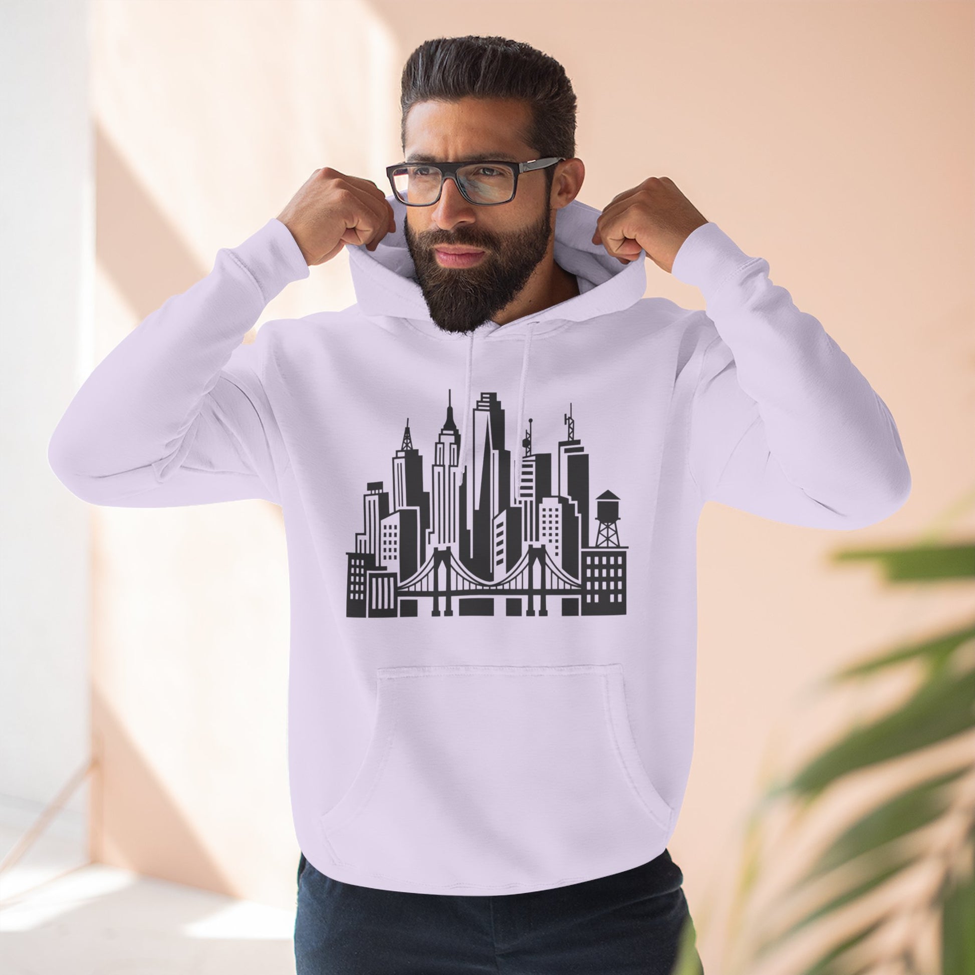 White pullover hoodie with black skyline bridge graphic and front kangaroo pocket