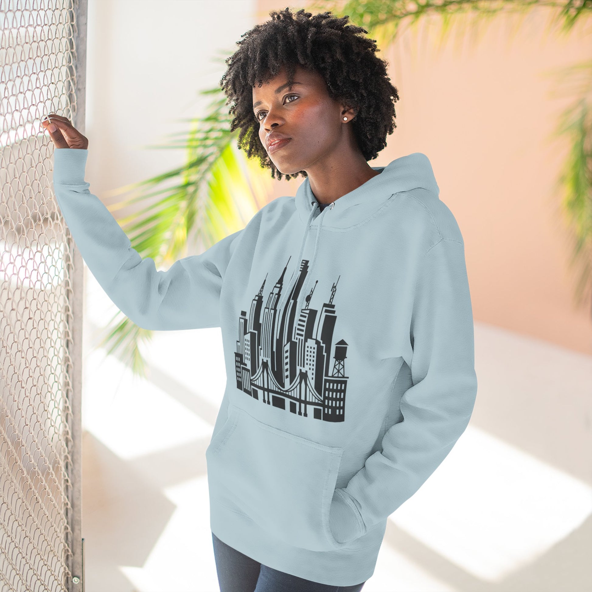 Blue mist pullover hoodie with black skyline bridge graphic and front kangaroo pocket