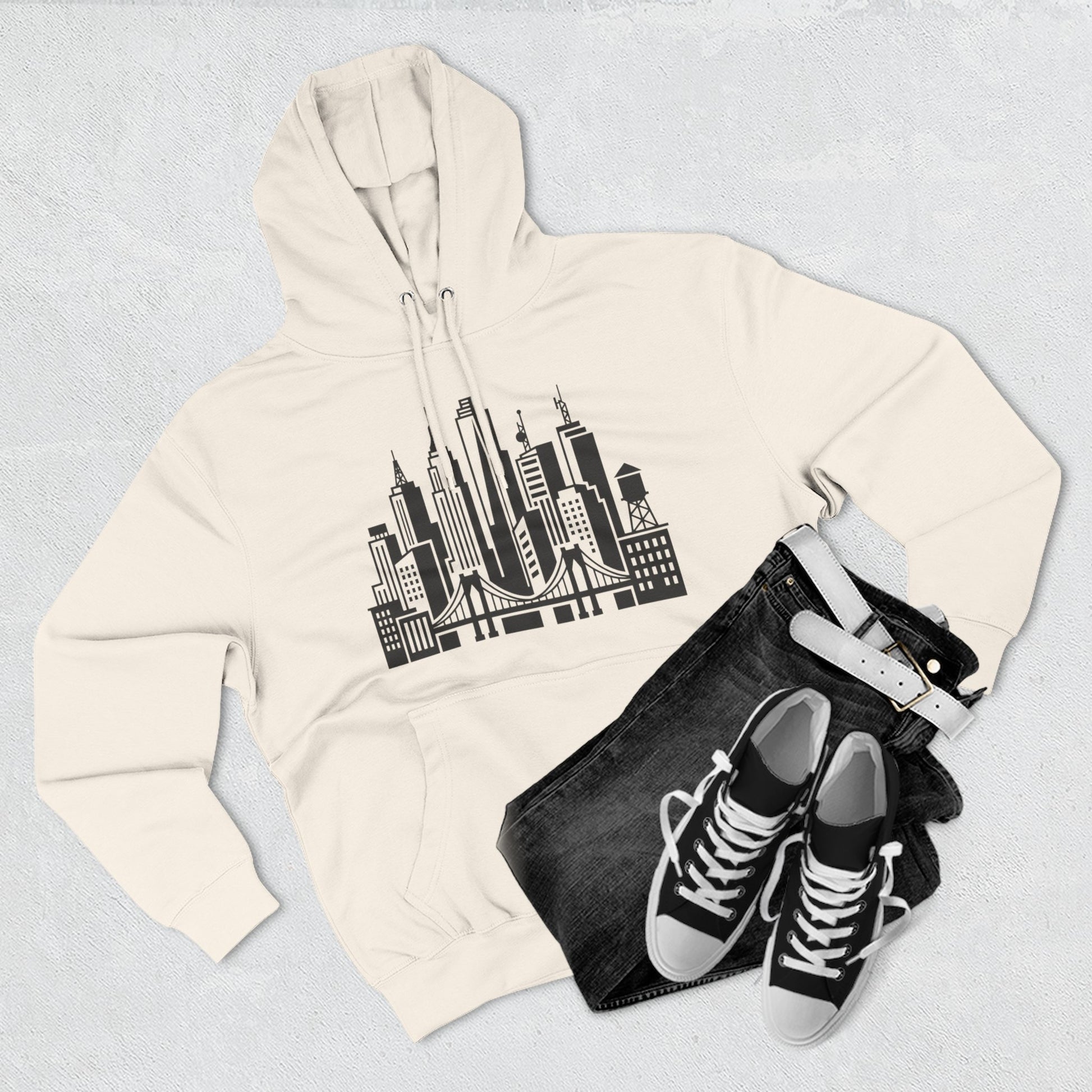 White unisex pullover hoodie with city skyline and bridge graphic on chest