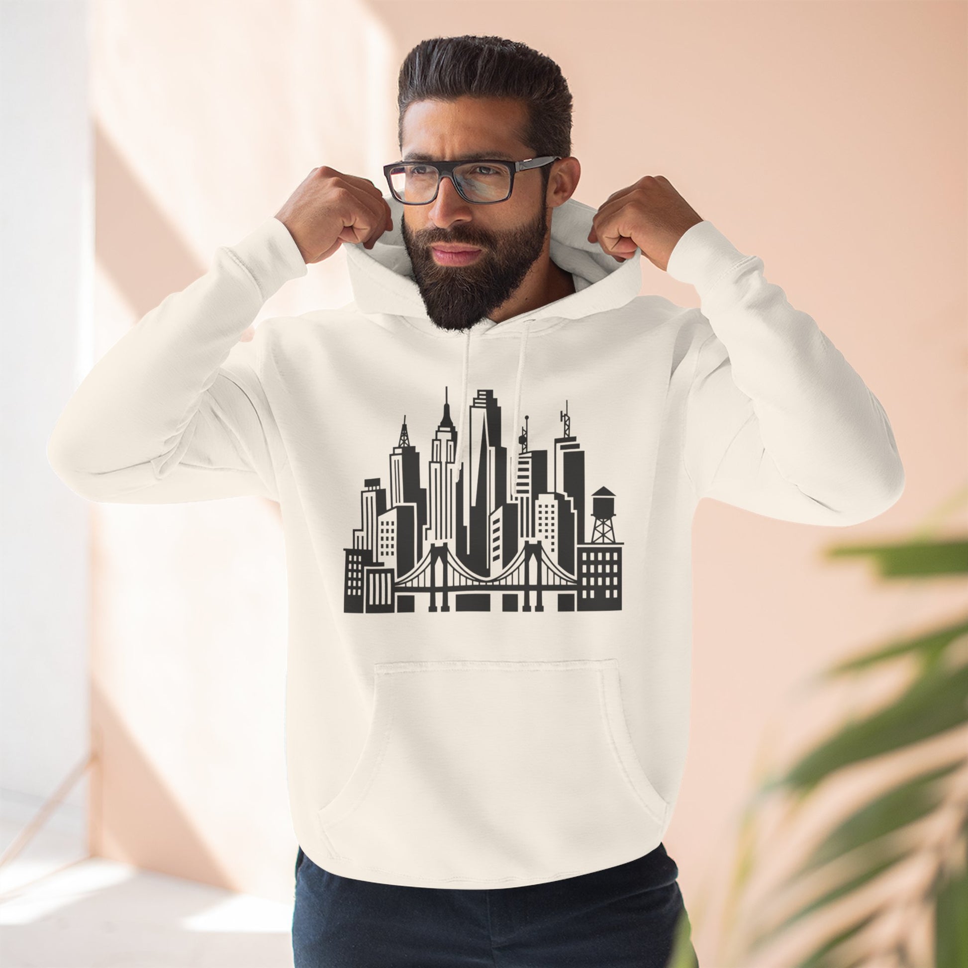White unisex pullover hoodie with hood and front city skyline and bridge graphic