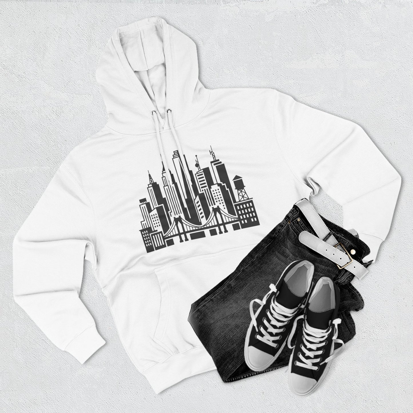 White unisex pullover hoodie with city skyline and bridge graphic across chest