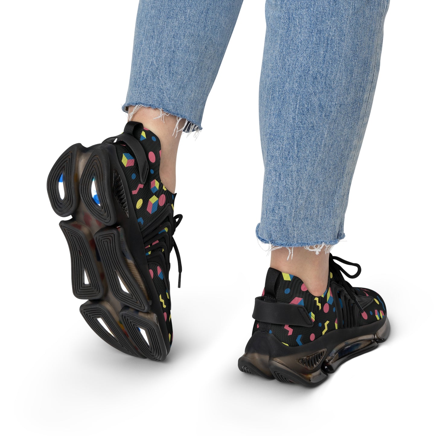 Geometric mesh sneakers with black sole, multicolor abstract pattern, lace-up athletic style