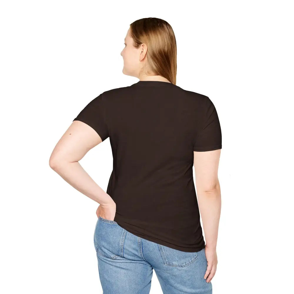 Woman in black T-shirt and jeans showcasing Aurora Mountain Adventure Tee with ribbed knit collar