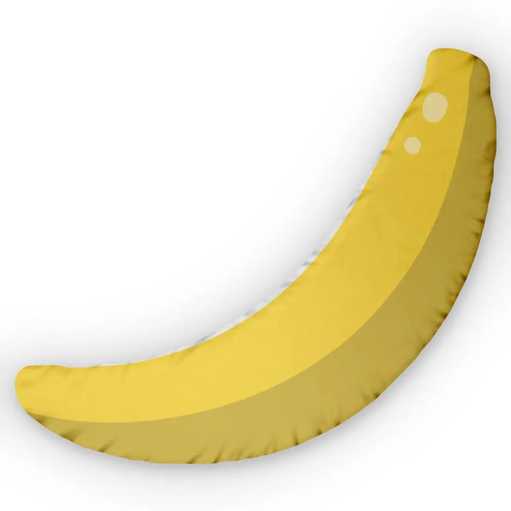 Ripe yellow banana with brown spots banana shaped pillow surreal fruit cushion PixiOnyx Playful Decor