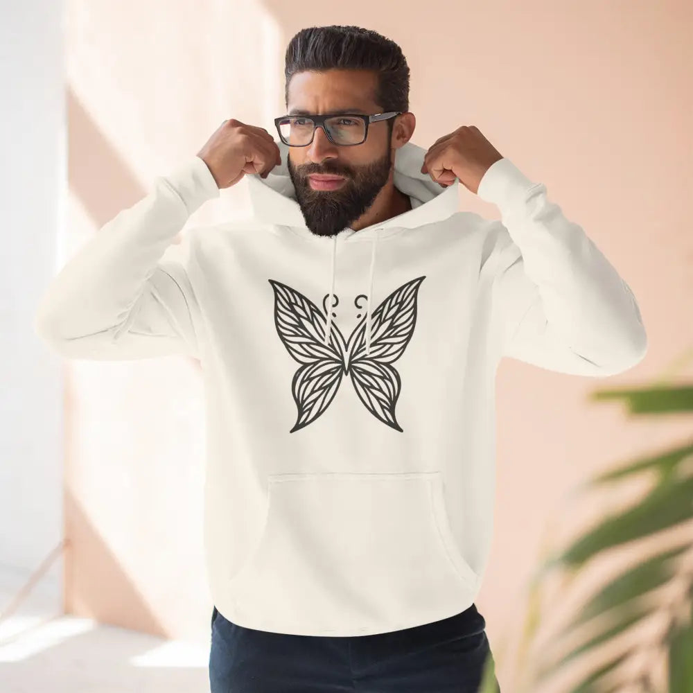 Cream-colored fleece hoodie with black butterfly graphic, perfect for fall fashion and casual wear