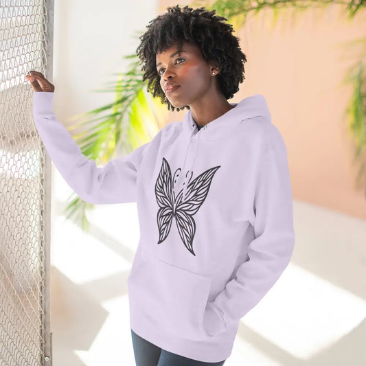 Woman in white fleece hoodie with black butterfly design, cozy fall casual wear