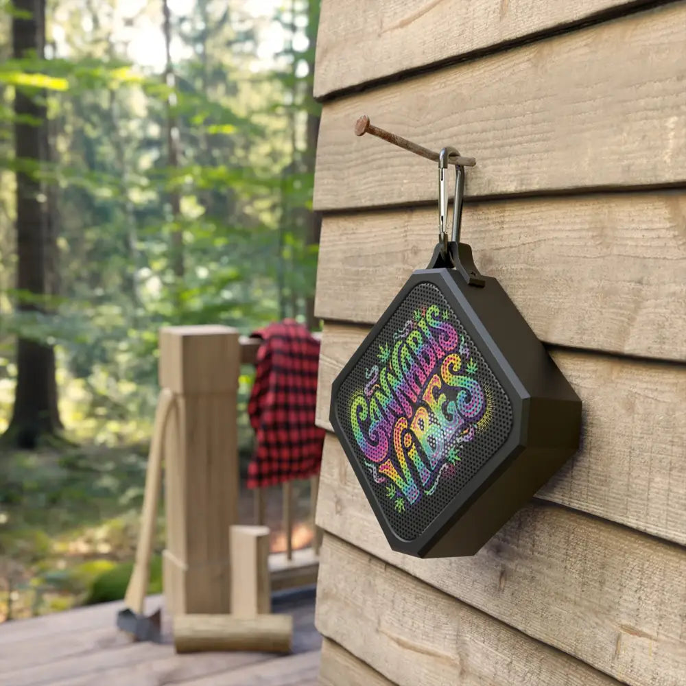 Black hexagonal cannabis vibes bluetooth speaker with colorful retro design for outdoor waterproof use