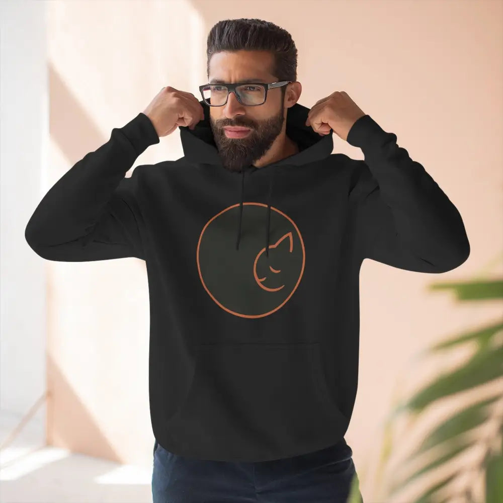 Black fleece hoodie with minimalist orange cat design, soft fabric, perfect for cat lovers