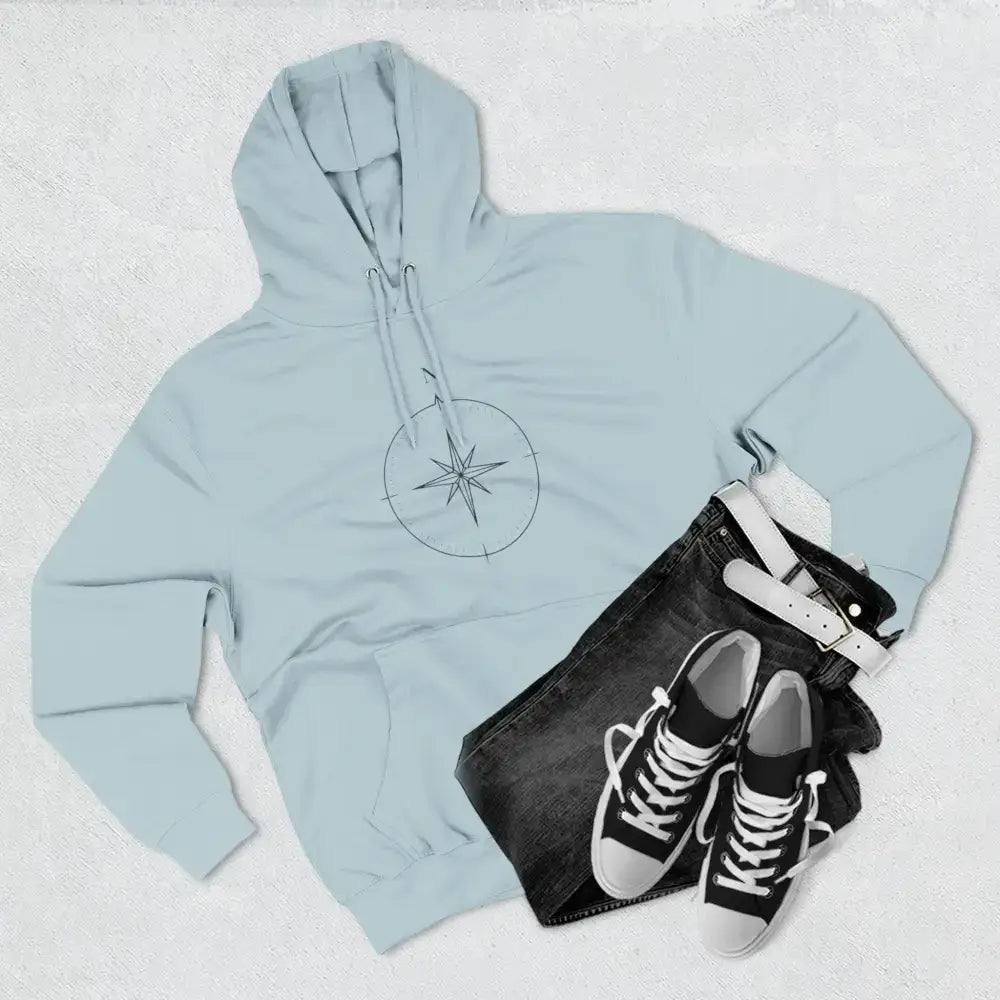 Light blue Cozy Compass Unisex Hoodie with compass rose graphic, adjustable hood, low heat care