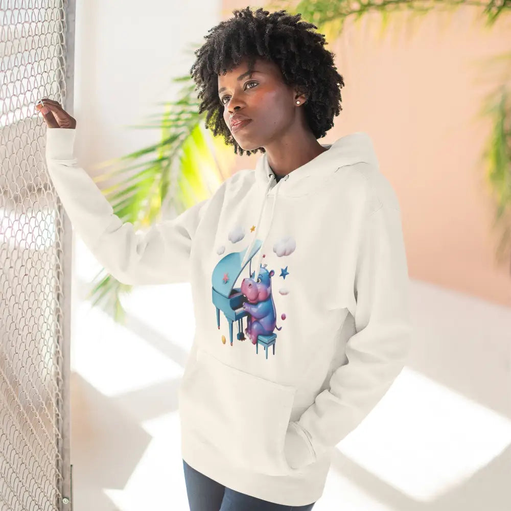 Woman in white fleece hoodie with cartoon hippo playing piano, cozy music lover gift