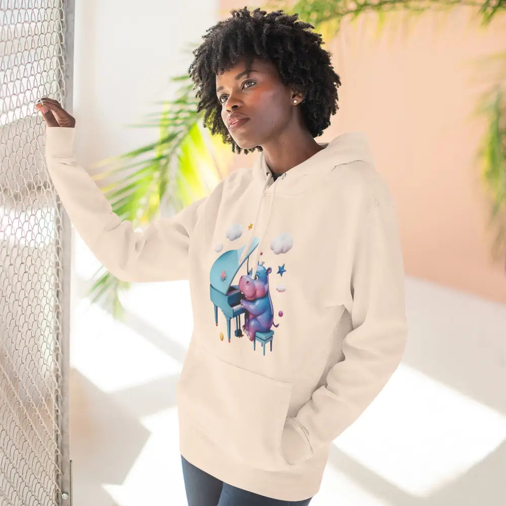 Light-colored fleece hoodie with playful hippopotamus playing piano, perfect gift for music lovers