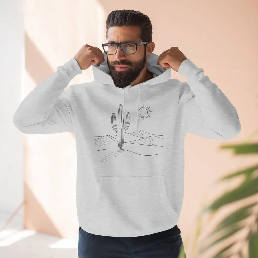 Man modeling white desert scene three-panel fleece hoodie with spacious kangaroo pocket