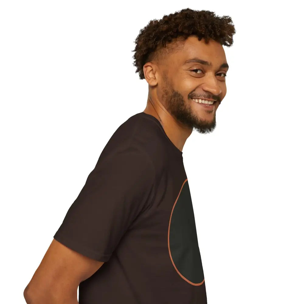 Man with curly hair and beard wearing a dark brown Dreamy Cat Graphic T-Shirt for cat lovers