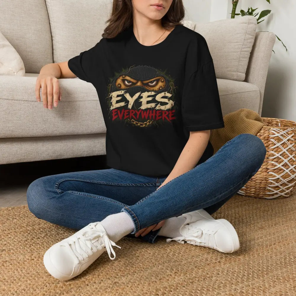 Black eyes everywhere t-shirt with creepy masked eyes graphic on ring-spun cotton with ribbed collar for low heat care