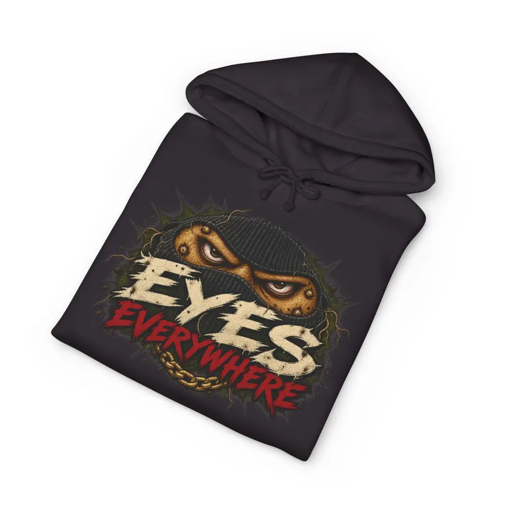 Black unisex hoodie with graphic eyes peeking through mask and distressed eyes everywhere text, machine wash max 30c care instructions