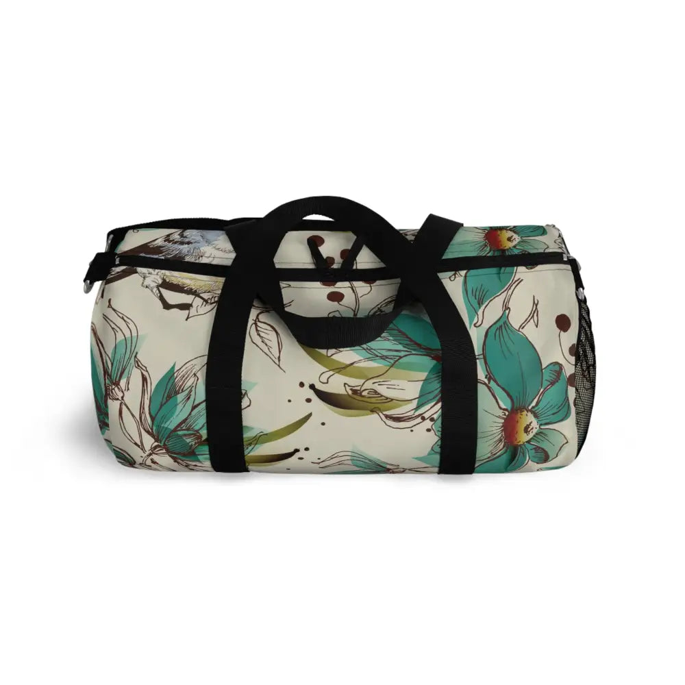 Floral duffel bag with black straps, perfect travel companion, robust with multiple compartments
