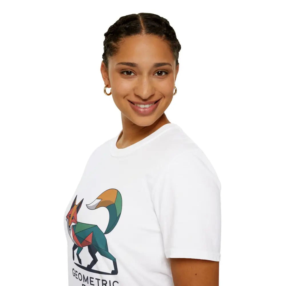 Woman in a white unisex softstyle t-shirt with a colorful unique geometric fox graphic for Earth Day