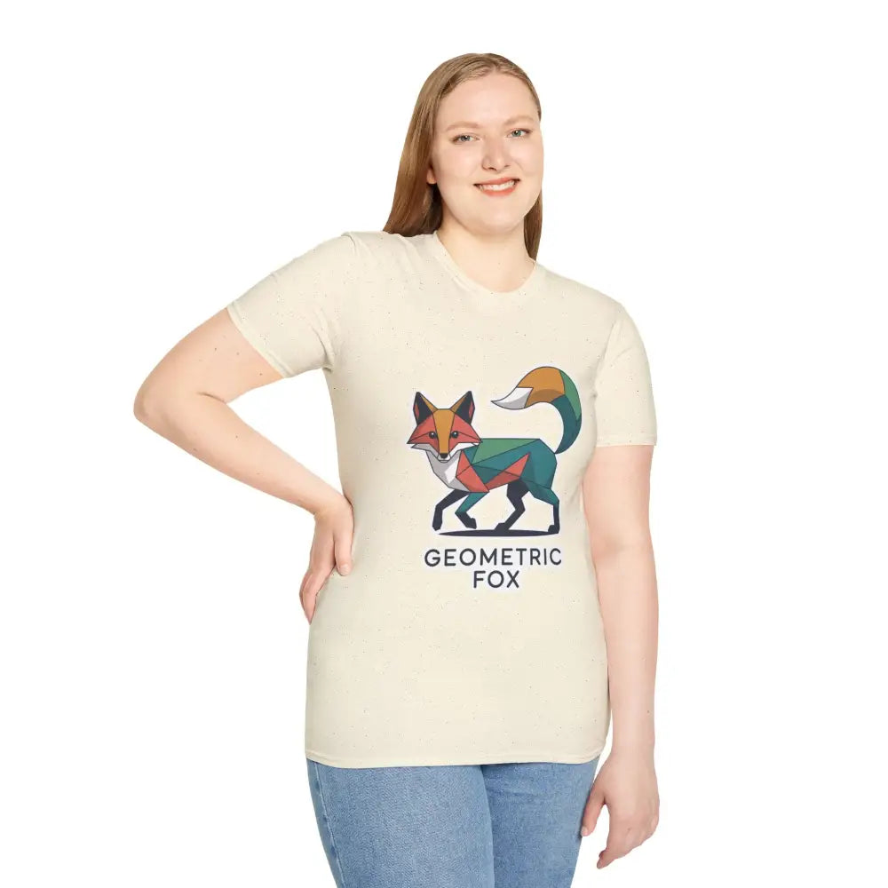 Woman wearing a light-colored unisex softstyle t-shirt with a unique geometric fox design for Earth Day