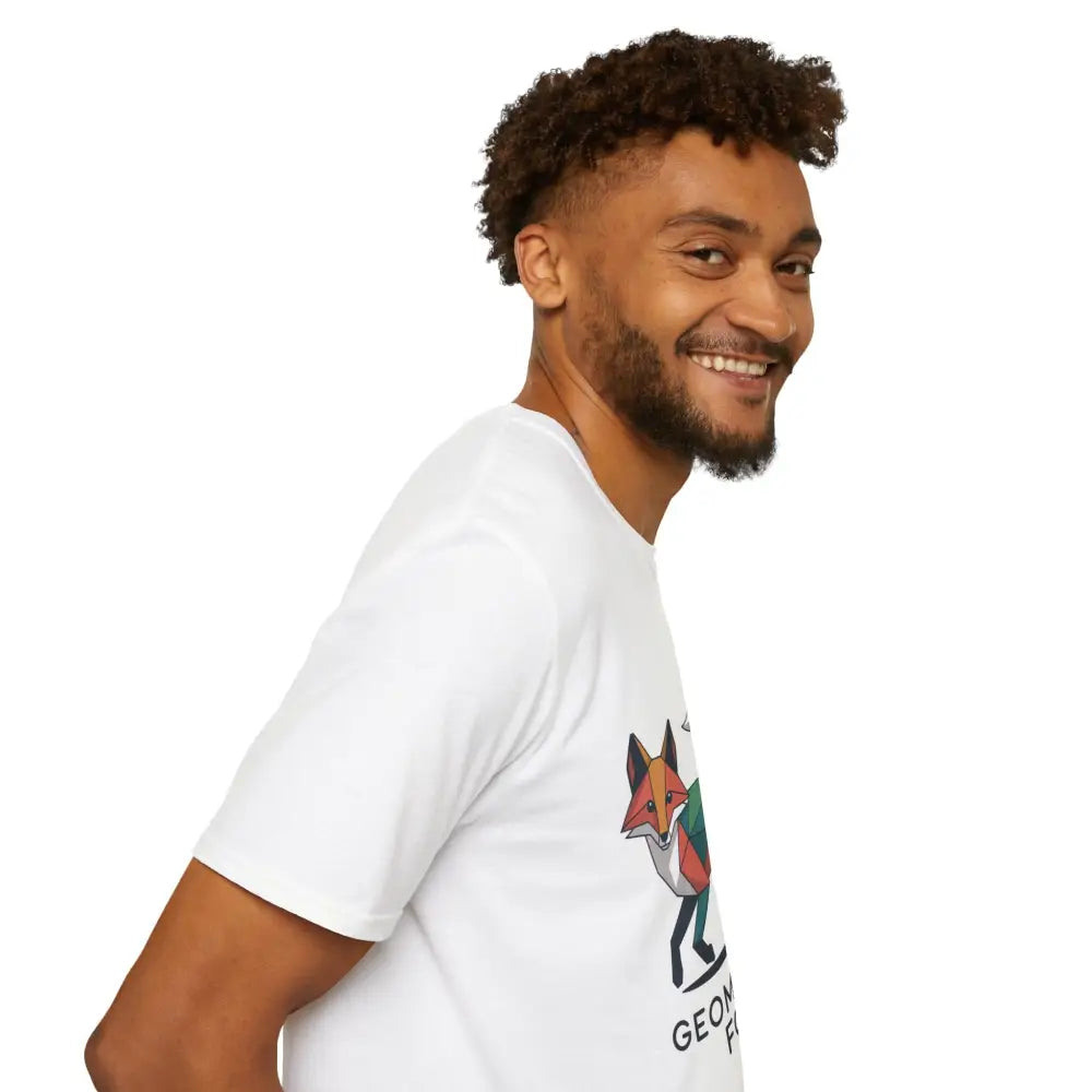 Smiling man wearing a white unisex softstyle t-shirt with a unique geometric fox graphic for Earth Day