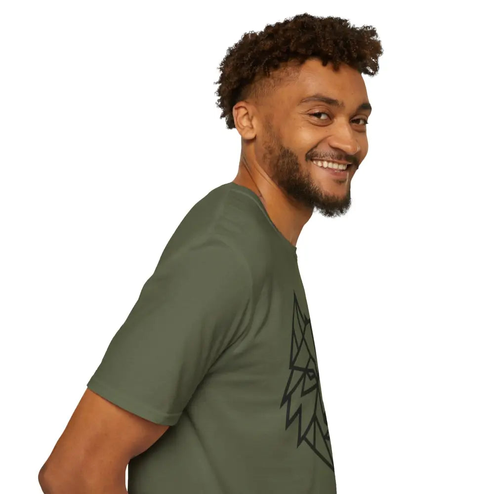 Smiling man with beard and curly hair wearing olive green geometric wolf softstyle tee