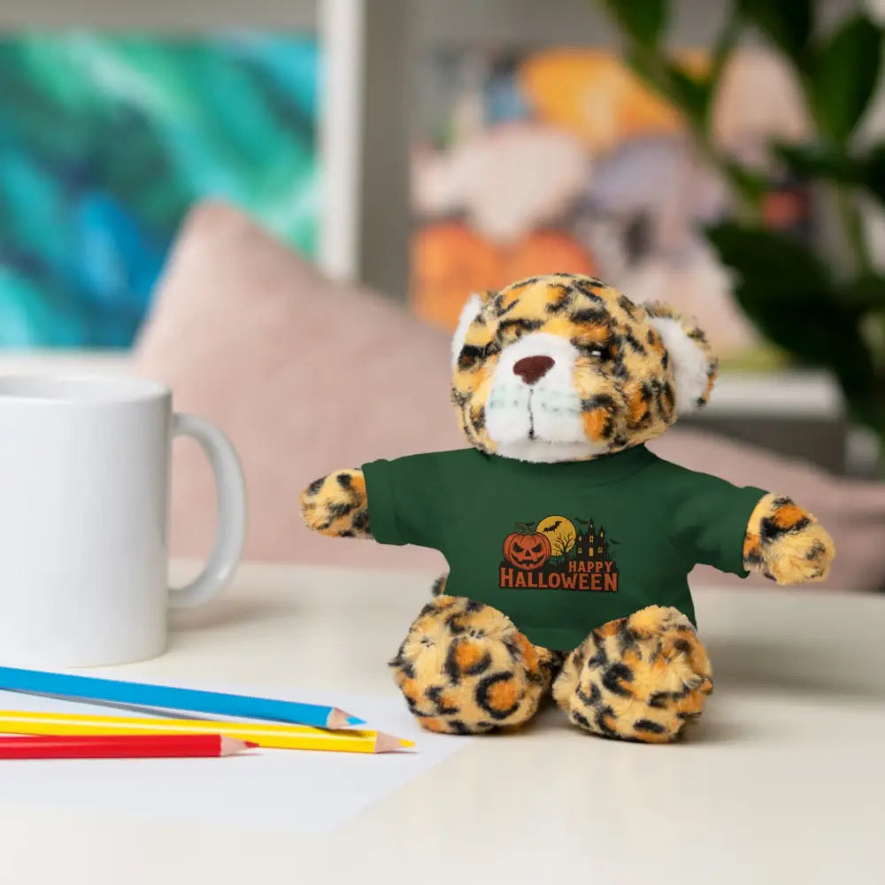 Plush leopard-spotted haunted house stuffed animal in dark green Halloween T-shirt