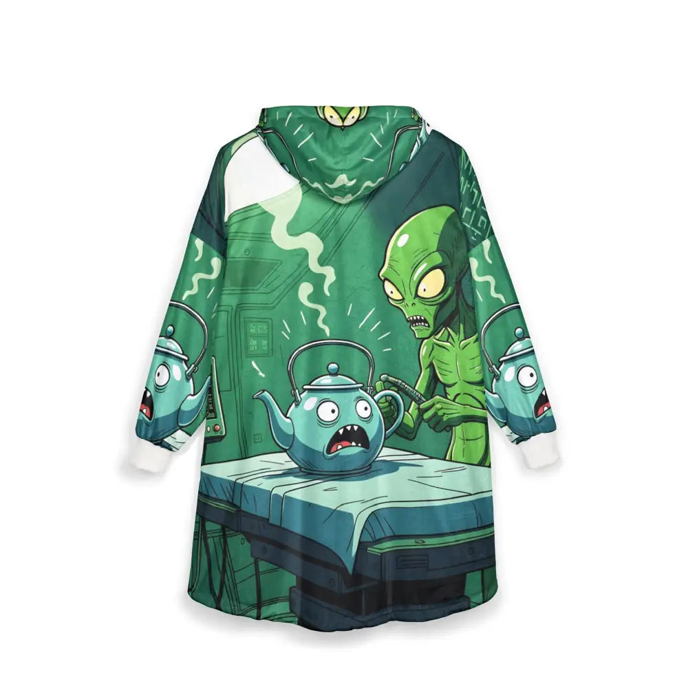 Green alien character on teapot hooded blanket from PixiOnyx Sci-Fi Cozywear collection