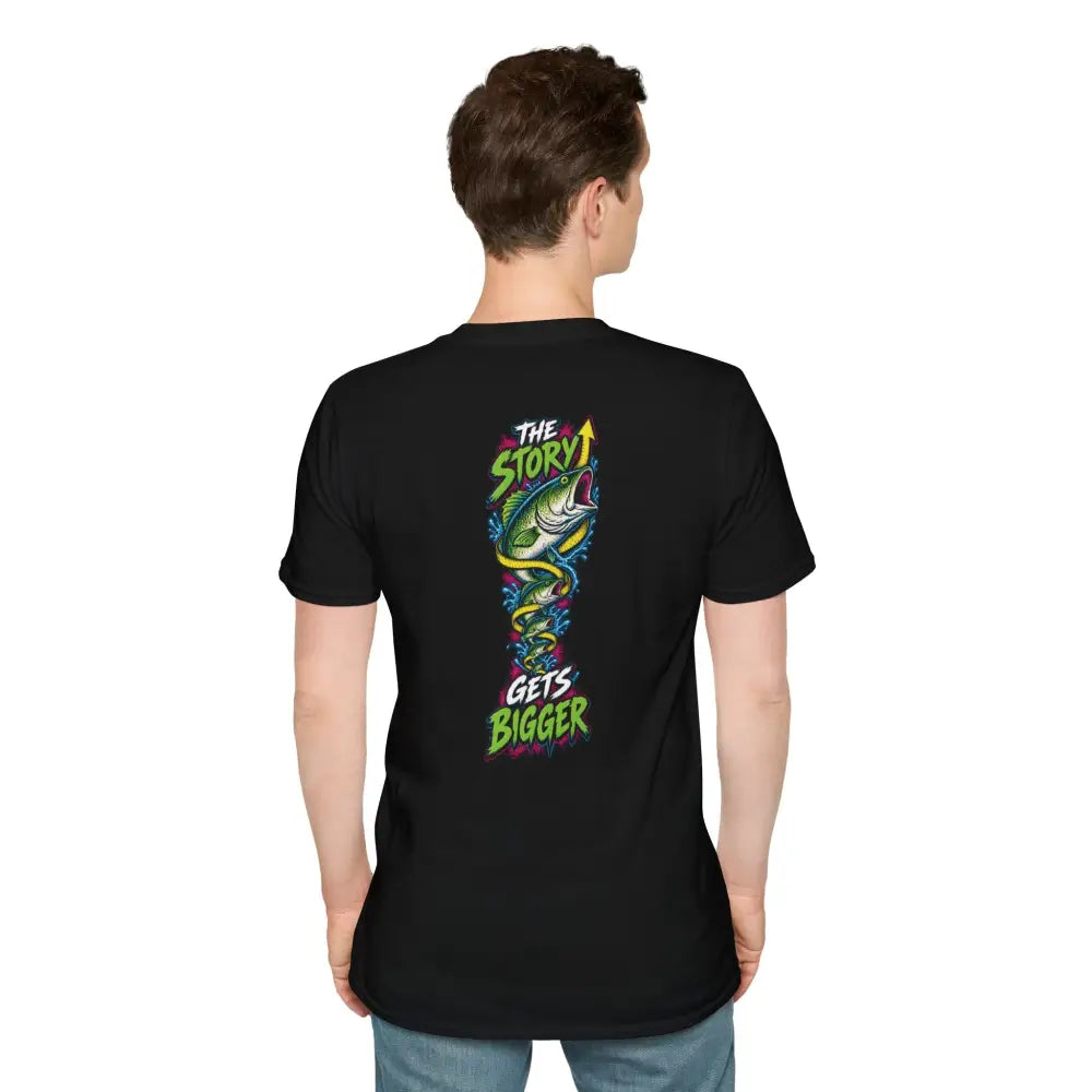 Black short-sleeved unisex t-shirt with colorful fish graphic and the story gets bigger text, care instructions low heat tumble dry