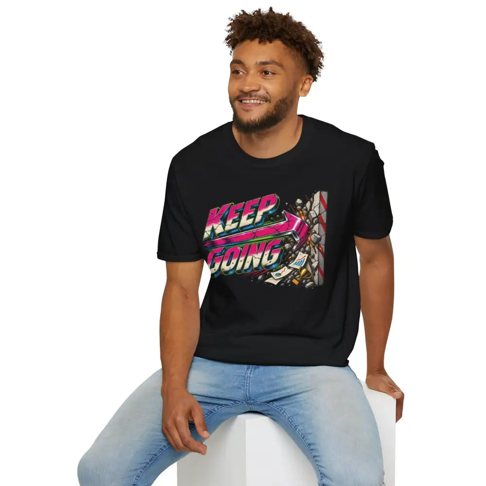 Black cotton keep going unisex t-shirt with neon pink teal graphic and arrow design tumble dry low heat care instructions