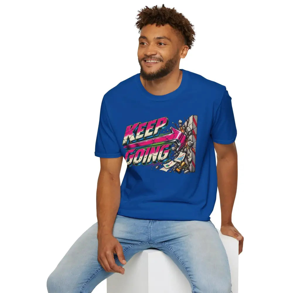 Blue cotton keep going unisex t-shirt with vibrant pink arrow graphic, low heat care instructions, tumble dry safe