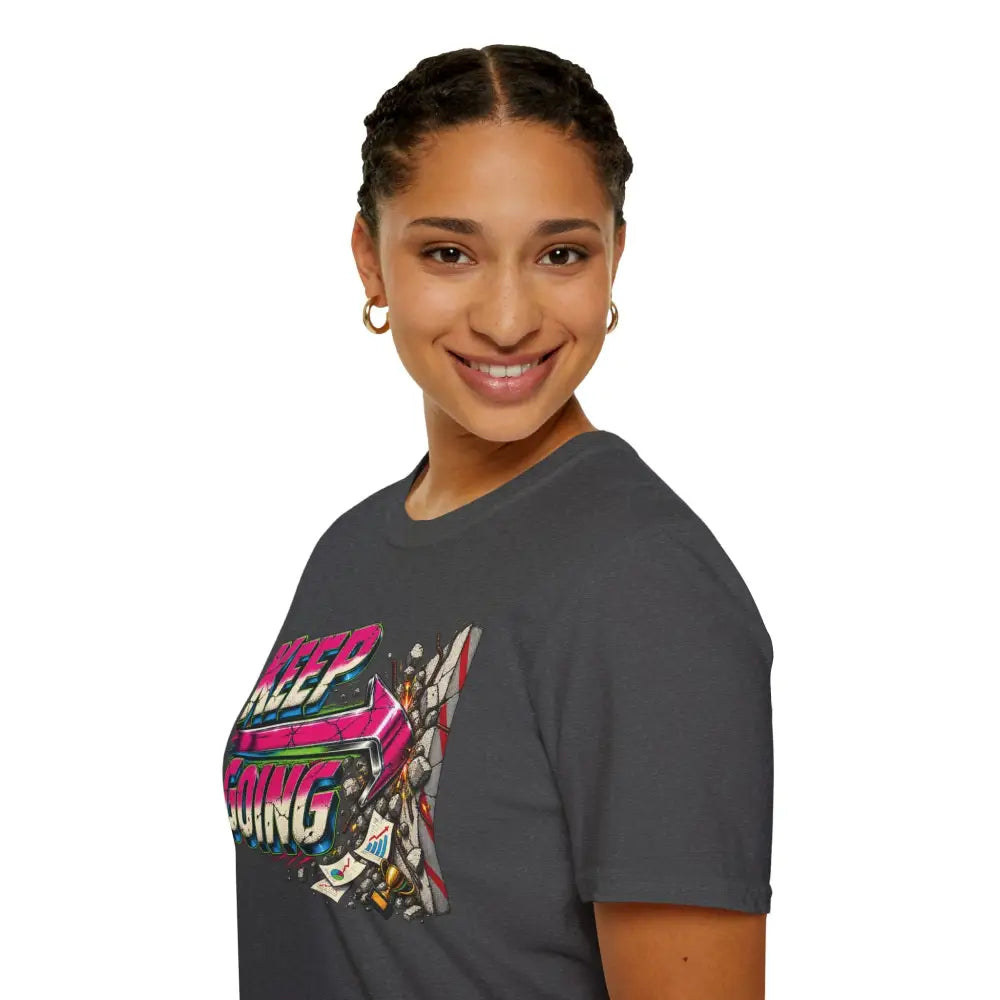 Dark gray cotton keep going unisex t-shirt with vibrant robot graphic and care instructions for low heat tumble dry