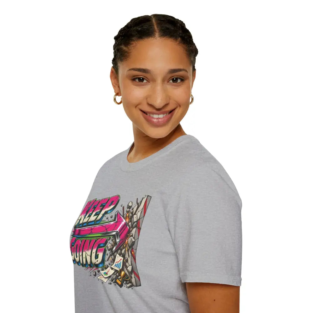 Gray cotton keep going unisex t-shirt with vibrant pink and blue graffiti graphic care instructions low heat tumble dry