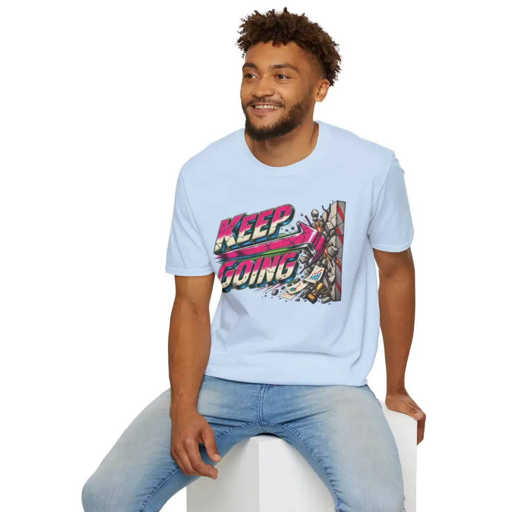 Light blue cotton keep going unisex t-shirt with vibrant retro graphic care instructions recommend low heat tumble dry