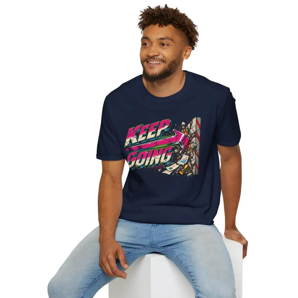 Navy blue keep going unisex t-shirt with vibrant pink teal graphic and broken glass design, low heat tumble dry care instructions
