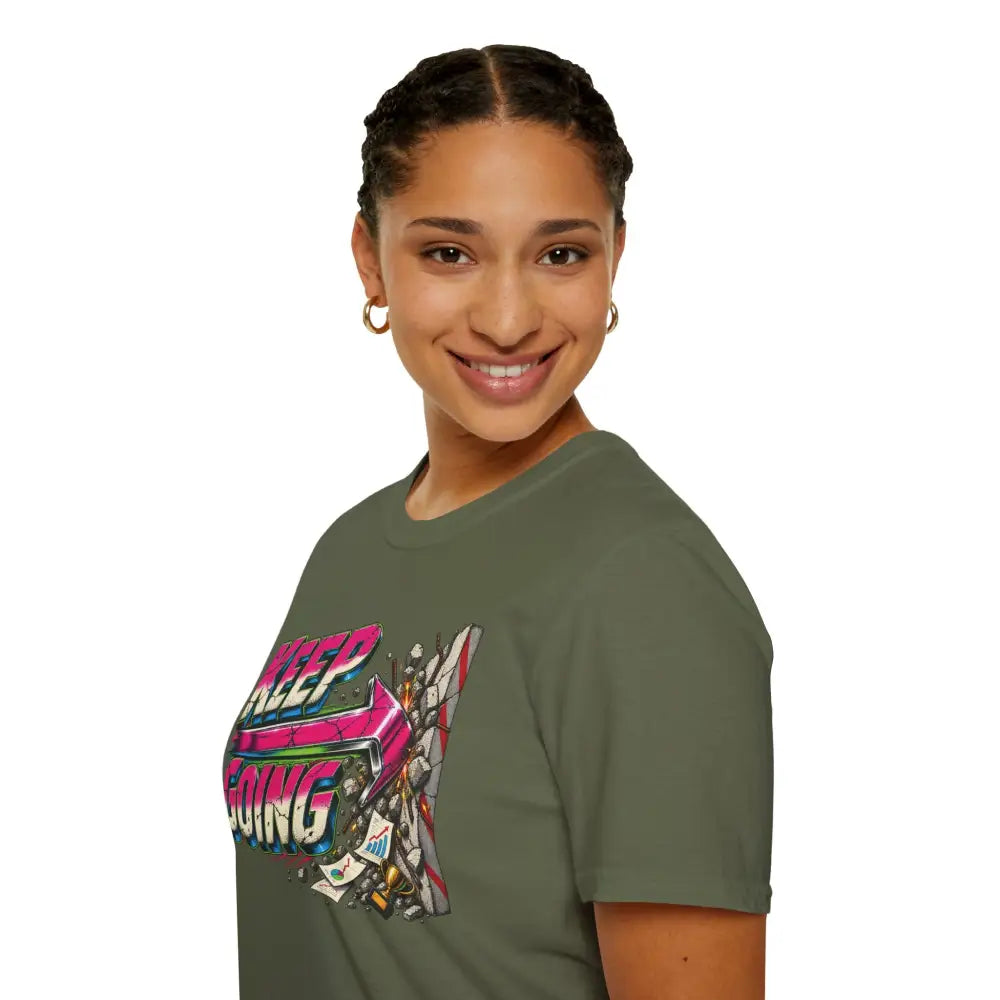Olive green cotton keep going unisex t-shirt with vibrant retro graphic, tumble dry low heat care instructions recommended