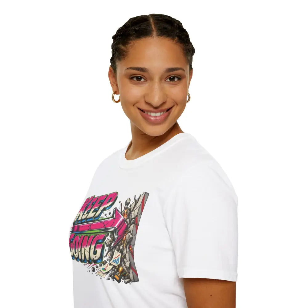 White keep going unisex t-shirt with vibrant pink blue black graffiti graphic made for low heat tumble dry care instructions