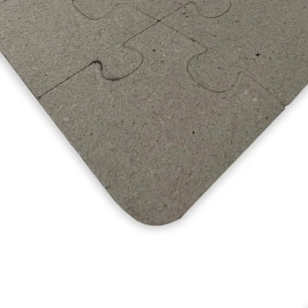 Gray cardboard jigsaw puzzle from Kids Jigsaw Puzzle Kawaii Dinos PixiOnyx Playtime Explorer Series