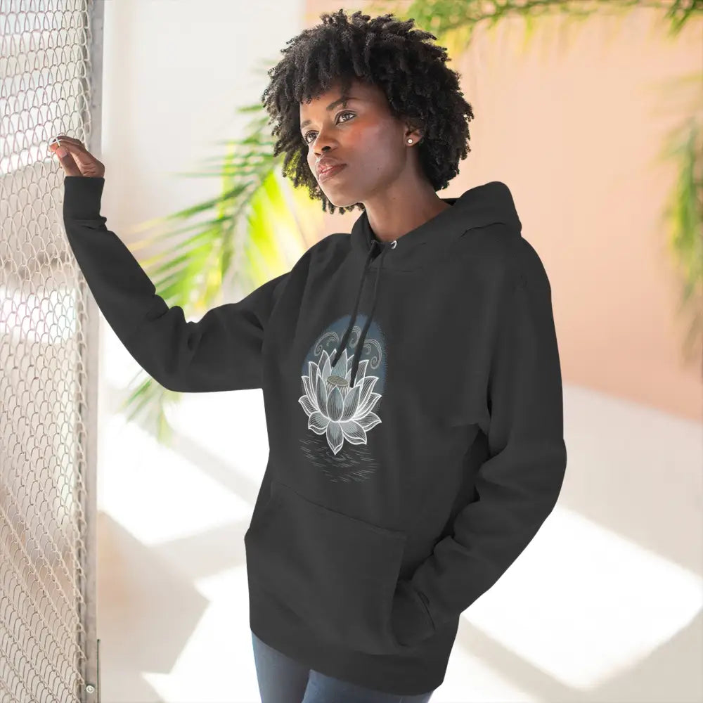 Black three-panel fleece hoodie with white lotus flower design, spacious kangaroo pocket and twill tape neck