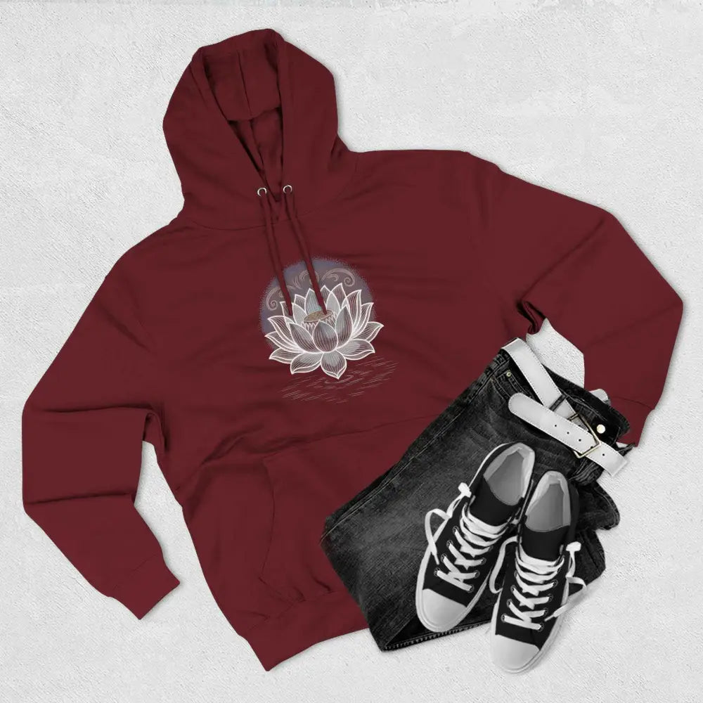 Maroon three-panel fleece hoodie with white lotus flower design, spacious kangaroo pocket, and twill tape neck