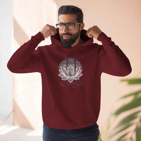 Man wearing maroon Lotus Blossom fleece hoodie with white lotus design, spacious kangaroo pocket