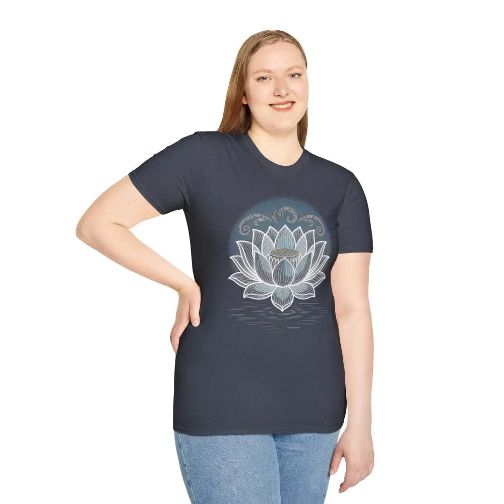 Woman in unisex softstyle t-shirt with white lotus flower design, enhancing aesthetic appeal