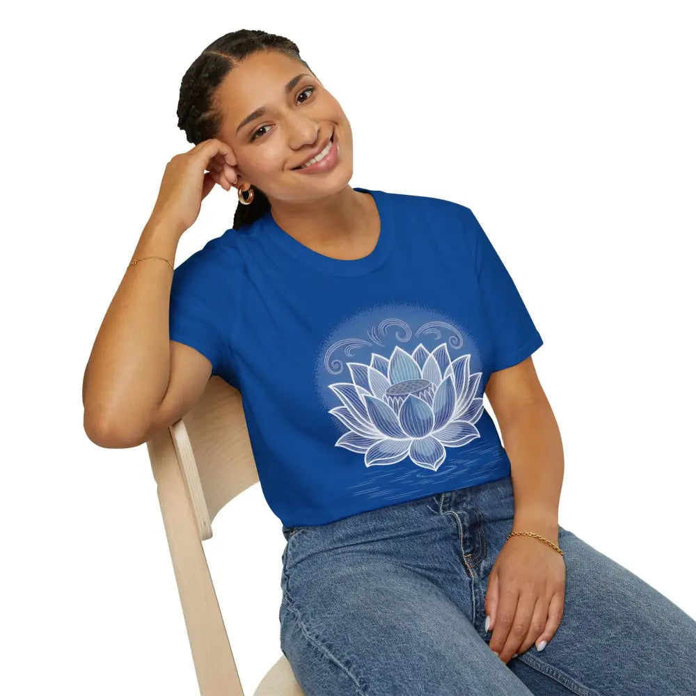 Smiling woman in blue Lotus Blossom Unisex Softstyle T-Shirt with lotus design, stylish and eco-friendly