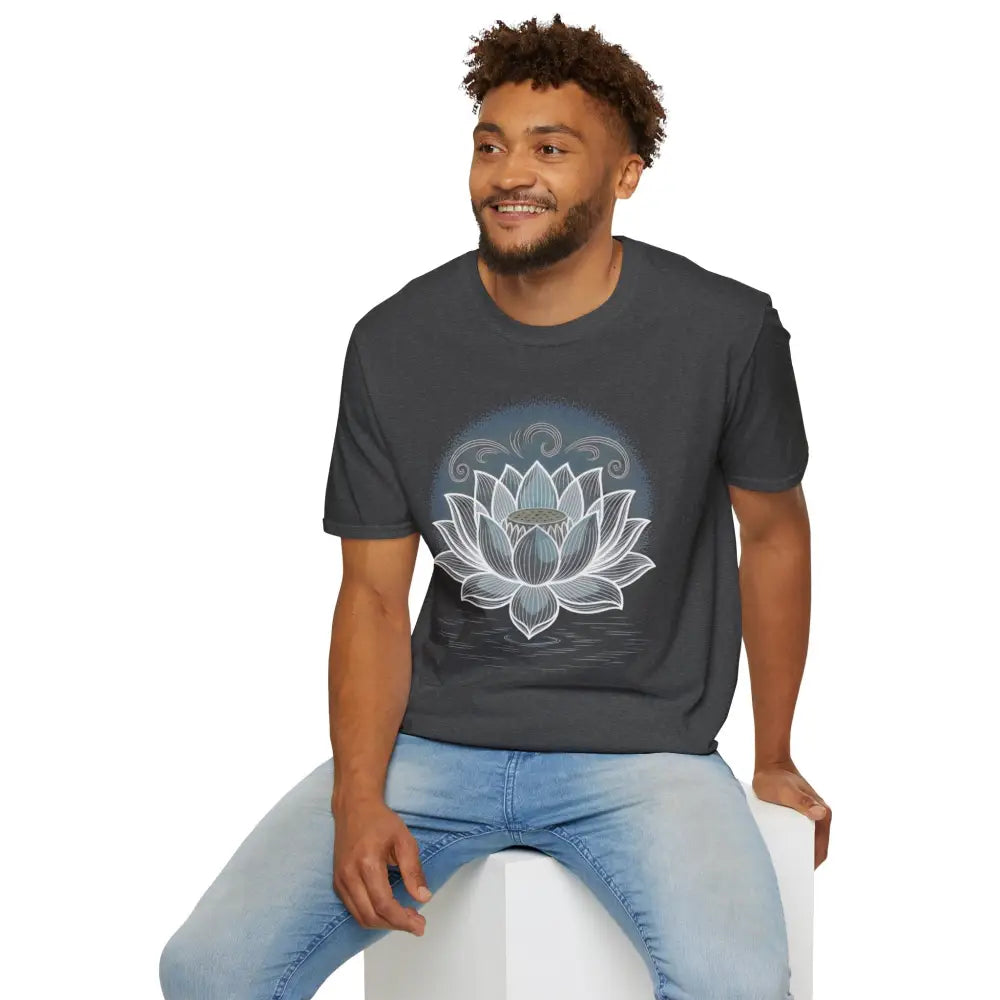 Man wearing unisex softstyle t-shirt with white lotus flower graphic for yoga and mindfulness