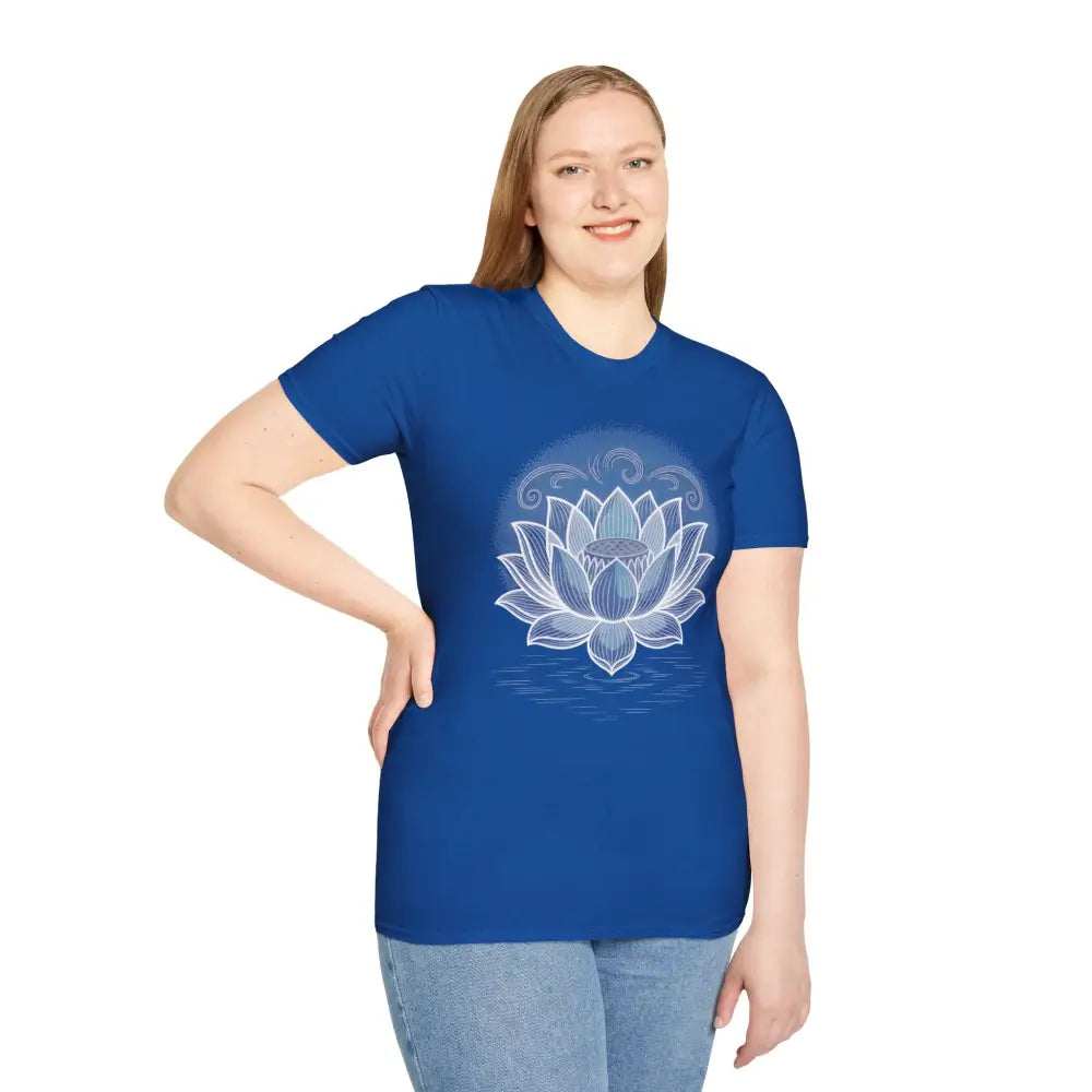 Woman wearing royal blue unisex softstyle t-shirt with white lotus design, enhancing aesthetic appeal