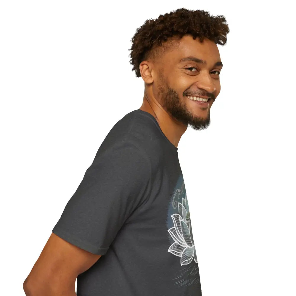Smiling man with beard and curly hair wearing Lotus Blossom unisex softstyle t-shirt