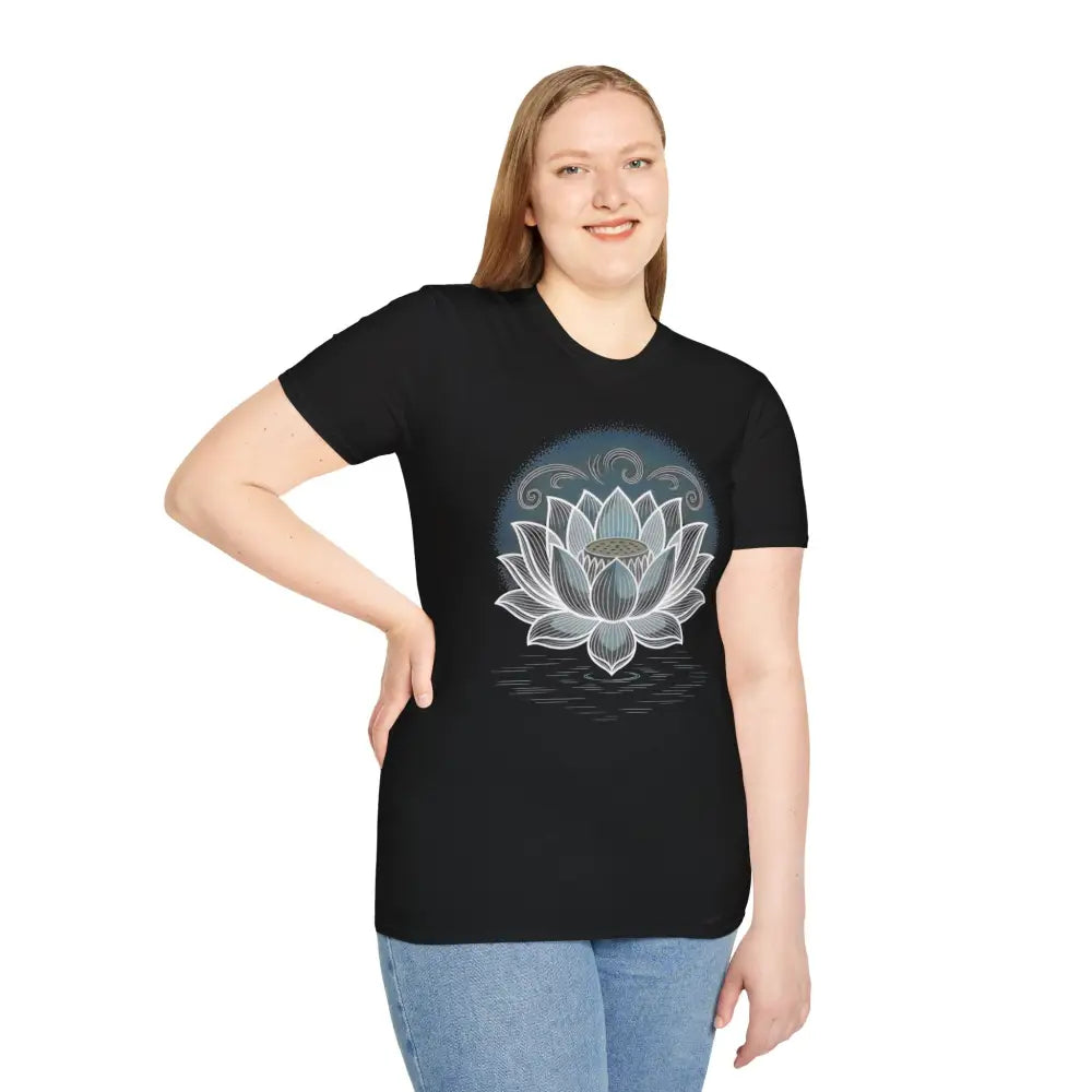 Woman wearing black unisex softstyle t-shirt with white lotus flower design for yoga and mindfulness
