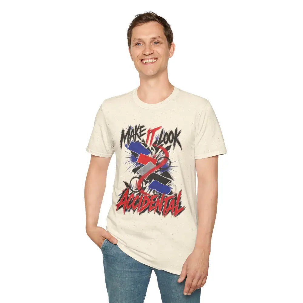Cream-colored cotton make it look accidental unisex t-shirt with graffiti-style graphic and care instructions tumble dry low heat
